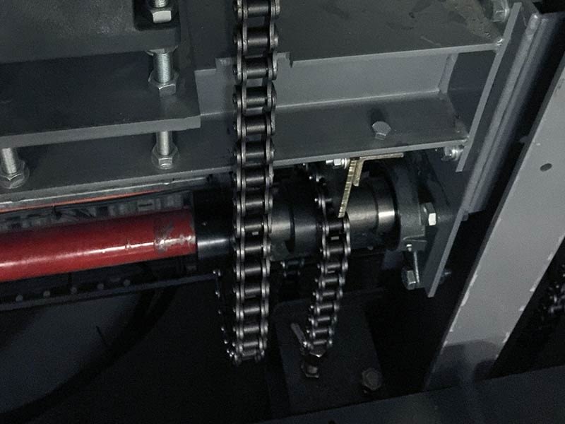 Close-up of the motor and chain system in a car stacker